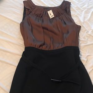 Belted, sleeveless black and brown dress